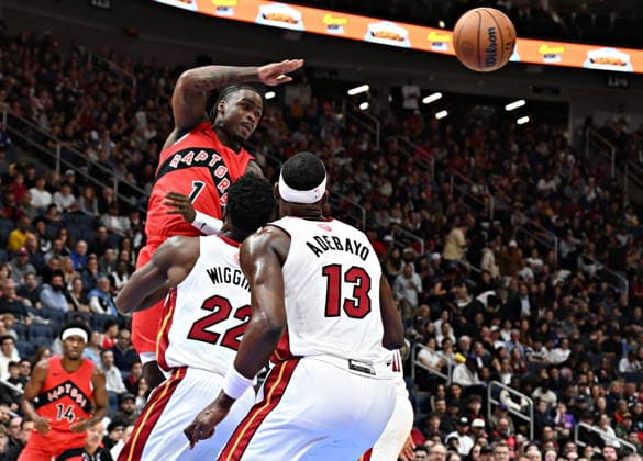 October 3, 2026, Quebec, On, Canada: Toronto Raptors Jamal Shead passes over Miami Heat s Andrew Wiggins and Bam Adebayo during NBA, Basketball Herren, USA preseason basketball action in Quebec City, Saturday, Oct. 3, 2026. Canada News - October 3, 2026 - ZUMAc35_ 20261003_zaf_c35_142 Copyright: xJacquesxBoissinotx