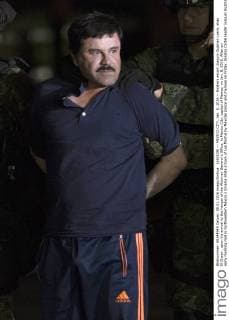 (160109) -- MEXICO CITY, Jan. 8, 2016 -- Soldiers escort Joaquin Guzman Loera, alias El Chapo , upon his arrival to the hangar of the Attorney General s Office, in Mexico City, capital of Mexico, on Jan. 8, 2016. After an early morning raid in northwestern Mexico s Sinaloa State s town of Los Mochis by Mexican police and marines on Friday, Sinaloa Cartel leader Joaquin Guzman Loera was recaptured, six months after his second prison break. ) MEXICO-MEXICO CITY-SECURITY-GUZMAN LOERA-RECAPTURE AlejandroxAyala