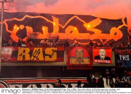 Feb. 1, 2016 - Cairo, Cairo, Egypt - Al Ahly fans, also known as Ultras , light flares and shout slogans at al-Ahly club s training stadium marking the fourt anniversary of killing al-Ahly fans in what known as the Port Said massacre , on February 1, 2016. On 1 February 2012, a massive riot occurred at Port Said Stadium in Port Said city, Egypt, following an Egyptian Premier League football match between El Masry and El Ahly clubs. At least 74 people were killed and more than 500 were injured after thousands of El Masry spectators stormed the stadium stands and the pitch Cairo Egypt - ZUMAap3_