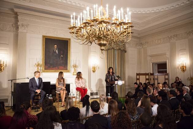 October 21, 2016 - Washington, DC, United States - In the State Dining Room of the White House, in Washington, D.C., USA, on 21 October 2016, First Lady Michelle Obama speaks to students during a Grammy Museum musical workshop with panelists, (l-r) Grammy Museum Executive Director Bob Santelli, music artist Michelle Williams, and singer Yolanda Adams. Washington United States - ZUMAn230 20161021_zaa_n230_265