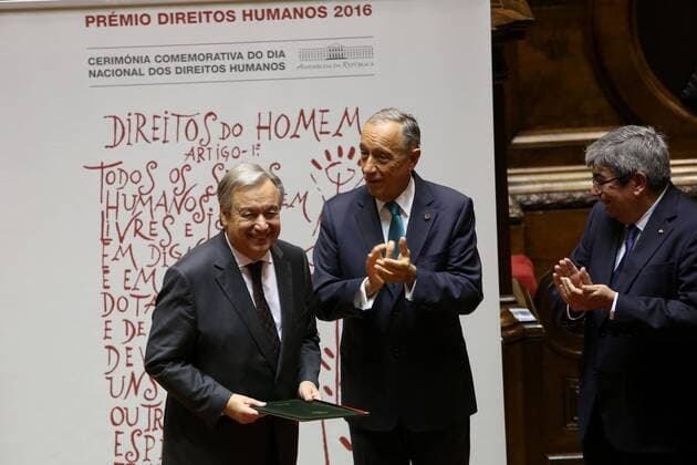 December 23, 2016 - Lisbon, Portugal - Portugal s President Marcelo Rebelo de Sousa (C) and Parliament President Eduardo Ferro Rodrigues (R) applaud Newly sworn-in Secretary General of the United Nations Antonio Guterres during a ceremony to award Guterres with a human rights award at the Parliament in Lisbon, Portugal, on December 23 2016. This year s award was given to Antonio Guterres, Secretary-General of the United Nations, for his work in the defense of human rights, especially in the discharge of the duties of United Nations High Commissioner for Refugees (UNHCR). This Prize is awarded annually by the President of the Assembly of the Republic, after hearing the Conference of Leaders, on the proposal of the jury constituted by the Committee on Constitutional Affairs, Rights, Freedoms and Guarantees. Photo: . Lisbon Portugal - ZUMAf123 26648318sp