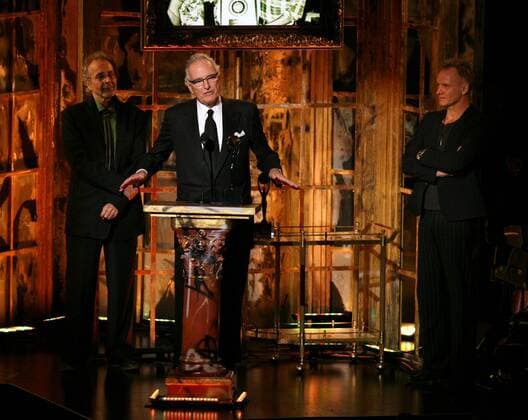 Mar 13, 2006; New York, New York, USA; Jerry Moss, at podium, and Herb Alpert, left, founders of A&M records and inductees of the Lifetime Achievement Award in the Non-Performer category, and presenter Sting during the 2006 Rock and Roll Hall of Fame induction ceremony. The 21st annunal 2006 Rock and Roll Hall of Fame induction ceremony took place at the Waldorf-Astoria Hotel in New York City. This year s inductees included Black Sabbath, Blondie, Miles Davis, Lynyrd Skynyrd, and the Sex Pistols. Mandatory - ZUMAc37_ 20060313_sha_c37_565 Copyright: xAngelxChevresttx