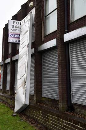 . 12 02 2017. Manchester, United Kingdom. Manchester Storms General view of a large sign hanging from a building following heavy winds in Stalybridge, Greater Manchester . xAnthonyxDevlinx xi-Imagesx IIM-14372-0003