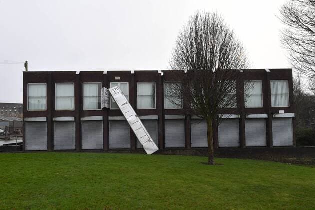 . 12 02 2017. Manchester, United Kingdom. Manchester Storms General view of a large sign hanging from a building following heavy winds in Stalybridge, Greater Manchester . xAnthonyxDevlinx xi-Imagesx IIM-14372-0006