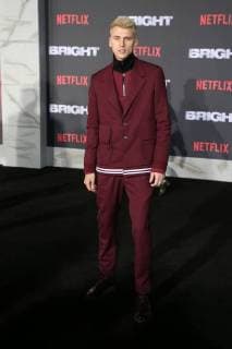 WESTWOOD, CA - DECEMBER 13: Machine Gun Kelly, at Premiere Of Netflix s Bright at The Regency Village Theatre, In Hollywood, California on December 13, 2017. Copyright: xFayexSadoux