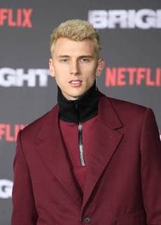 WESTWOOD, CA - DECEMBER 13: Machine Gun Kelly, at Premiere Of Netflix s Bright at The Regency Village Theatre, In Hollywood, California on December 13, 2017. Copyright: xFayexSadoux