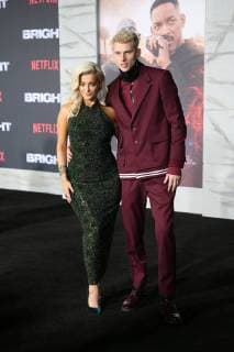 WESTWOOD, CA - DECEMBER 13: Bebe Rexha, Machine Gun Kelly, at Premiere Of Netflix s Bright at The Regency Village Theatre, In Hollywood, California on December 13, 2017. Copyright: xFayexSadoux