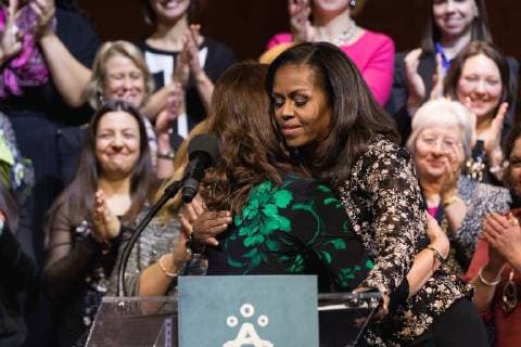 February 2, 2018 - Washington, DC, United States - (L-R): Kristen Perry of Chicago, Ill., hugs former First Lady Of the U.S. Michelle Obama, who presented her with the 2018 School Counselor of the Year award, at the John F. Kennedy Center for the Performing Arts in Washington, D.C., on Friday, Feb. 2, 2018. ( ) Washington United States - ZUMAn230 20180202_zaa_n230_367 Copyright: xCherissxMayx