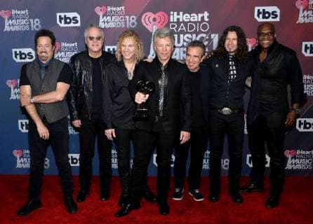 (L-R) John Shanks, Hugh McDonald, David Bryan, Jon Bon Jovi, Tico Torres, Phil X, and Everett Bradley of Bon Jovi, recipients of the Icon Award, appear backstage during the iHeartRadio Music Awards at The Forum in Inglewood, California on March 11, 2018. Turner s TBS, TNT, and truTV channels broadcasted the ceremony live from The Forum. LAP20180311258 JIMxRUYMEN