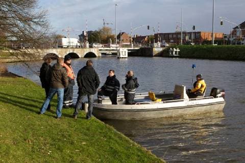 - BRUGGE, BELGIUM: Illustration picture shows divers and police during the search for Frederic Coopman, Tuesday 13 December 2011 in the Ringvaart river in Brugge. 20 year old student Coopman has been missing since he left a party on Saturday, his gray woolen hat and one of his black gloves were found at the Gentpoort in Brugge. KURTxDESPLENTER x31604076x