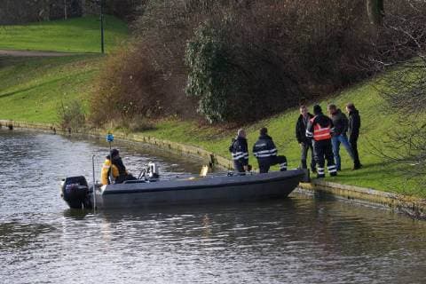 - BRUGGE, BELGIUM: Illustration picture shows divers and police during the search for Frederic Coopman, Tuesday 13 December 2011 in the Ringvaart river in Brugge. 20 year old student Coopman has been missing since he left a party on Saturday, his gray woolen hat and one of his black gloves were found at the Gentpoort in Brugge. KURTxDESPLENTER x31604082x