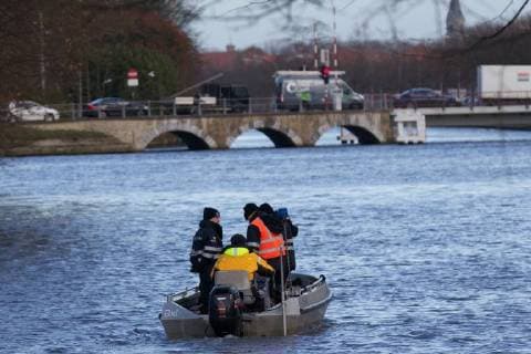 - BRUGGE, BELGIUM: Illustration picture shows divers and police during the search for Frederic Coopman, Tuesday 13 December 2011 in the Ringvaart river in Brugge. 20 year old student Coopman has been missing since he left a party on Saturday, his gray woolen hat and one of his black gloves were found at the Gentpoort in Brugge. KURTxDESPLENTER x31604161x