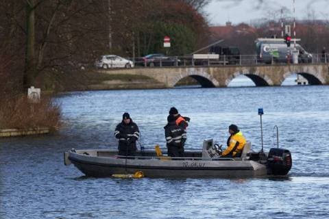 - BRUGGE, BELGIUM: Illustration picture shows divers and police during the search for Frederic Coopman, Tuesday 13 December 2011 in the Ringvaart river in Brugge. 20 year old student Coopman has been missing since he left a party on Saturday, his gray woolen hat and one of his black gloves were found at the Gentpoort in Brugge. KURTxDESPLENTER x31604177x