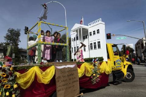 December 9, 2018 - Los Angeles, California, United States - A float containing children in a cage and a replica of the White House, in opposition to the Trump administration s detention of illegal immigrants, takes part in the procession honoring Our Lady of Guadalupe in Los Angeles, California on December 9, 2018. Los Angeles United States - ZUMAn230 20181209_zaa_n230_550 Copyright: xRonenxTivonyx