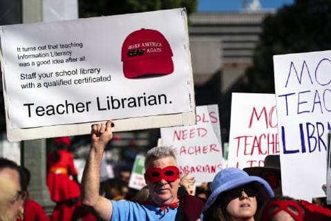 December 15, 2018 - Los Angeles, California, United States - Teachers and supporters of public education march against education funding cuts during the March for Public Education in Los Angeles, California on December 15, 2018. The rally, organized by United Teachers Los Angeles, drew thousands of educators who demanded wage increases and smaller class sizes. Los Angeles United States - ZUMAn230 20181215_zaa_n230_885 Copyright: xRonenxTivonyx