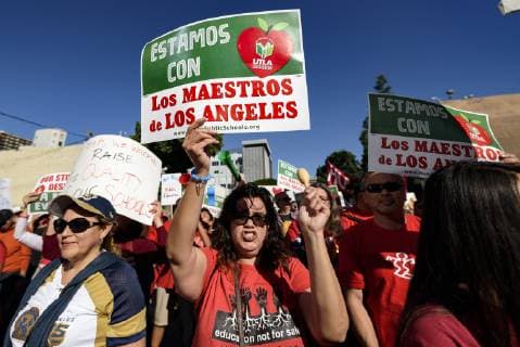 December 15, 2018 - Los Angeles, California, United States - Teachers and supporters of public education march against education funding cuts during the March for Public Education in Los Angeles, California on December 15, 2018. The rally, organized by United Teachers Los Angeles, drew thousands of educators who demanded wage increases and smaller class sizes. Los Angeles United States - ZUMAn230 20181215_zaa_n230_896 Copyright: xRonenxTivonyx