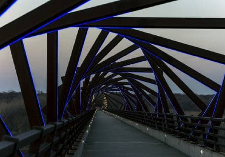 March 22, 2019 - Madrid, Iowa, U.S. - Originally a conduit for rail freight, but now a decomissioned railroad line, the High Trestle Trail Bridge is part of the 25-mile Trestle Trail path for bikers, hikers and horseback riders. The artistic, spiral steel frames springing up from the road bed are a nod to the shape of the timbers placed in former central Iowa coal mines. Madrid U.S. - ZUMAce6_ 20190322_zaf_ce6_016 Copyright: xBrianxCahnx