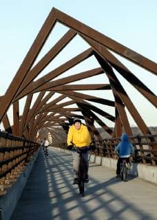 March 22, 2019 - Madrid, Iowa, U.S. - Originally a conduit for rail freight, but now a decomissioned railroad line, the High Trestle Trail Bridge is part of the 25-mile Trestle Trail path for bikers, hikers and horseback riders. The artistic, spiral steel frames springing up from the road bed are a nod to the shape of the timbers placed in former central Iowa coal mines. Madrid U.S. - ZUMAce6_ 20190322_zaf_ce6_010 Copyright: xBrianxCahnx