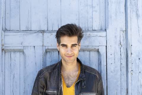 Portrait of smiling man wearing leather jacket model released Symbolfoto AFVF02698