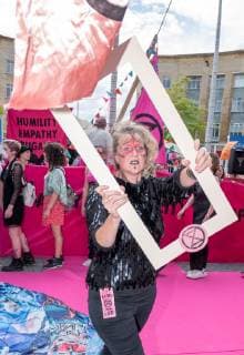 June 1, 2019 - Bristol, Bristol, UK - Bristol, UK. Extinction Rebellion s catwalk fashion show in Bristol s Broadmead shopping centre. Campaigners from Extinction Rebellion are carrying out a five-hour protest which will include everything from a ˜pop-up™ catwalk to blocking the city centre traffic. The protest targets Bristol™s fashion and clothes stores with people urged to not buy any new items of clothing for the next year. There will also be a ˜pop-up catwalk™, where designers will be showing off their work to demonstrate the needed shift away from fast fashion towards a fairer, safer, cleaner, more transparent fashion industry. People are encouraged to repair, re-use, alter, upcycle and recycle clothes in a year-long boycott aiming to economically disrupt the fashion and textile industry demanding that it drastically chang - ZUMAl94_ 20190601_zaf_l94_045 Copyright: xSimonxChapmanx