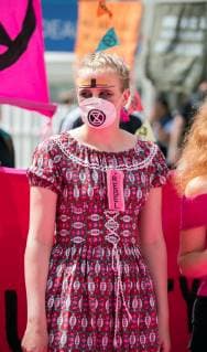 June 1, 2019 - Bristol, Bristol, UK - Bristol, UK. Extinction Rebellion s catwalk fashion show in Bristol s Broadmead shopping centre. Campaigners from Extinction Rebellion are carrying out a five-hour protest which will include everything from a ‘pop-upâ€⠢ catwalk to blocking the city centre traffic. The protest targets Bristolâ€⠢s fashion and clothes stores with people urged to not buy any new items of clothing for the next year. There will also be a ‘pop-up catwalkâ€⠢, where designers will be showing off their work to demonstrate the needed shift away from fast fashion towards a fairer, safer, cleaner, more transparent fashion industry. People are encouraged to repair, re-use, alter, upcycle and recycle clothes in a year-long boycott aiming to economically disrupt the fashion and textile industry demanding th - ZUMAl94_ 20190601_zaf_l94_054 Copyright: xSimonxChapmanx