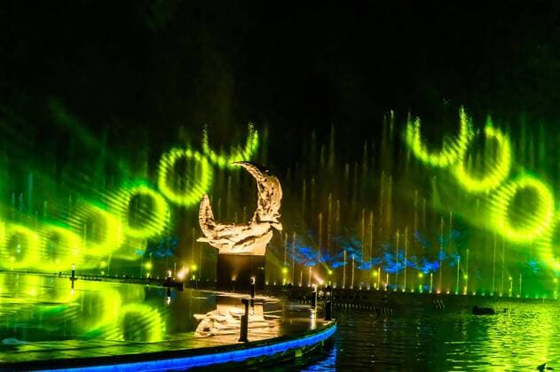 July 19, 2019 - Jilin, Jilin, China - Jilin, CHINA-The musical fountain lighting show in Jingyuetan national forest park in Changchun, capital of northeast China s Jilin province, opens on July 1, 2019.Music fountain waterscape light show is located in the goddess square at the main entrance of jingyuetan, taking the statue of the goddess of the clear moon as the central point, composed of fountain, LED beam light, LED full color tree light, LED full color wash wall light, pattern light, etc., which can combine hundreds of action forms. Jilin China - ZUMAs145 20190719_zaa_s145_073 Copyright: xChixXiaoweix