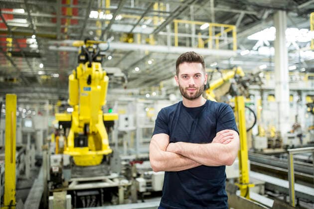 Portrait of confident worker in a modern factory model released Symbolfoto property released WESTF24315