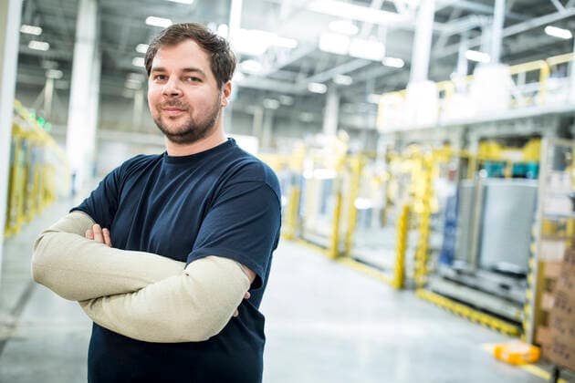 Portrait of confident worker in a modern factory model released Symbolfoto property released WESTF24316