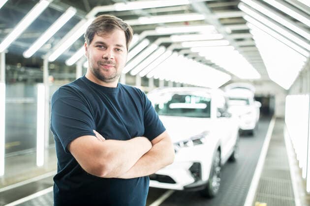 Portrait of confident worker in modern car factory model released Symbolfoto property released WESTF24399