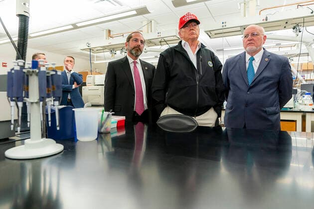 March 6, 2020, Atlanta, GA, United States of America: U.S President Donald Trump joined by the Secretary of Health and Human Services Alex Azar, left, Director of Centers for Disease Control and Prevention Dr. Robert Redfield, right, speaks with reporters during a visit to the Centers for Disease Control and Prevention March 6, 2020 in Atlanta, Georgia. Atlanta United States of America - ZUMAp138 20200306_zaa_p138_069 Copyright: xShealahxCraighead WhitexHousex