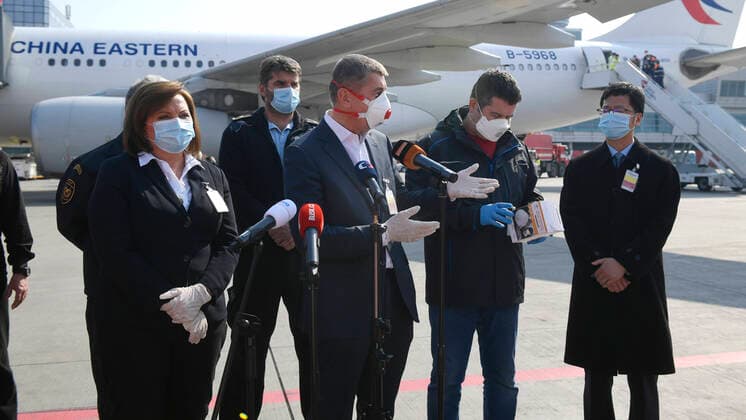 The Czech state reckons with three aircraft a week delivering health material from China during six weeks, Interior Minister Jan Hamacek, second from right, (Social Democrats, CSSD) told journalists today, on Friday, March 20, 2020. Later today, the bought consignment with 1.1 million respirators landed at the Vaclav Havel International Airport Prague. They will be shipped to the central store in Pardubice, East Bohemia, and then distributed in the regions, Hamacek said. Another two consignments with health materials are to come here on Saturday. The first aircraft from China, bringing 150,000 rapid testers for the novel coronavirus, landed in Prague on Wednesday night. On the photo left there is Czech Finance Minister Alena Schillerova and centre PM Andrej Babis. (CTKxPhoto MichalxKamaryt) CTKPhotoP202003200386401 _KMT6272