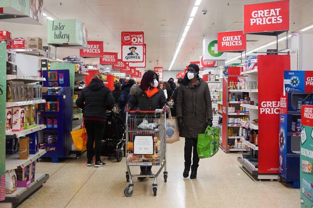 (200320) -- LONDON, March 20, 2020 (Xinhua) -- People go shopping in a Sainsbury s in London, Britain, on March 20, 2020. Cafes, bars, pubs and restaurants must close from Friday night across Britain in a bid to contain the spread of COVID-19 outbreak, British Prime Minister Boris Johnson said Friday. As of 9 a.m. local time (0900 GMT) Friday, the number of confirmed COVID-19 cases in Britain reached 3,983, according to UK s Department of Health and Social Care. As of 1 p.m. (1300 GMT), 177 patients who tested positive for COVID-19 have died. (Photo by Joe Newman Xinhua) BRITAIN-LONDON-COVID-19-SHOPPING
