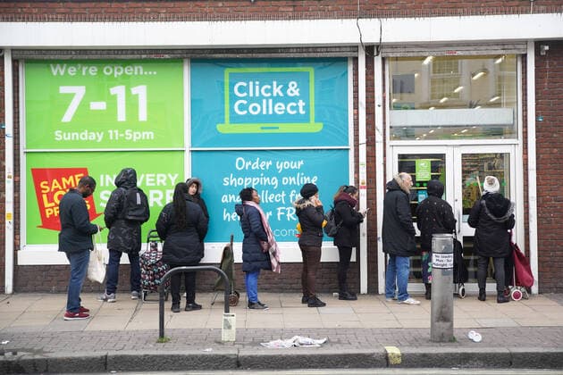 (200320) -- LONDON, March 20, 2020 (Xinhua) -- Shoppers line up outside an Asda store in South London, Britain, on March 20, 2020. Cafes, bars, pubs and restaurants must close from Friday night across Britain in a bid to contain the spread of COVID-19 outbreak, British Prime Minister Boris Johnson said Friday. As of 9 a.m. local time (0900 GMT) Friday, the number of confirmed COVID-19 cases in Britain reached 3,983, according to UK s Department of Health and Social Care. As of 1 p.m. (1300 GMT), 177 patients who tested positive for COVID-19 have died. (Photo by Joe Newman Xinhua) BRITAIN-LONDON-COVID-19-SHOPPING