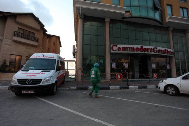 March 21, 2020, Gaza City, Gaza Strip, Palestinian Territory: A Palestinian man stands at the entrance of Commodore Gaza Hotel, after preventive measures are taken against the coronavirus, in Gaza city on March 21, 2020. Gazans may be trying to make light of coronavirus on social media, comparing lockdowns to the Israeli blockade, but fears are growing of a disastrous outbreak in the Palestinian territory. With movement in and out of the territory severely restricted since long before the pandemic emerged, the Gaza Strip is perhaps one of the few places on earth with a chance of staying virus-free Gaza City Palestinian Territory - ZUMAap3_ 20200321_zaf_ap3_029 Copyright: xMahmoudxAjjourx