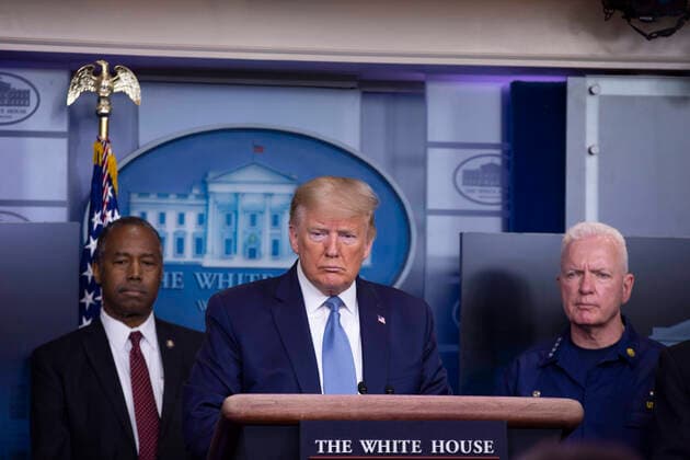 March 21, 2020, Washington, District of Columbia, USA: United States President Donald J. Trump, center, makes remarks on the Coronavirus crisis in the Brady Press Briefing Room of the White House in Washington, DC on Saturday, March 21, 2020. Listening at left is US Secretary of Housing and Urban Development (HUD) Ben Carson and at right is Admiral Brett Giroir, US Assistant Secretary for Health Washington USA - ZUMAs152 20200321_zaa_s152_012 Copyright: xStefanixReynoldsx