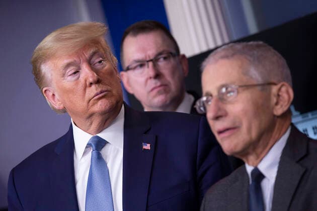 March 21, 2020, Washington, District of Columbia, USA: United States President Donald J. Trump, left, listens as Director of the National Institute of Allergy and Infectious Diseases at the National Institutes of Health Dr. Anthony Fauci, right, makes remarks on the Coronavirus crisis in the Brady Press Briefing Room of the White House in Washington, DC on Saturday, March 21, 2020. Listening at center is Pete Gaynor, Administrator, Federal Emergency Management Agency (FEMA) Washington USA - ZUMAs152 20200321_zaa_s152_017 Copyright: xStefanixReynoldsx