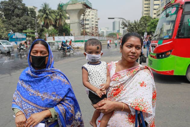 March 22, 2020, Dhaka, Dhaka, Bangladesh: Bangladeshi people take precaution during the spread of coronavirus, in Dhaka, Bangladesh, March 22, 2020. 3 more tested positive for COVID-19, raising the number of coronavirus patients to 27 in Bangladesh. The Bangladeshi government has imposed a restriction on all kinds of political, social, cultural and religious gatherings in an effort to contain the further spread of novel coronavirus in the country. Besides, people having fever, cough, influenza or other symptoms of COVID-19 as well as family members of coronavirus-infected patients and those come in contact with the patients have been asked not to go to mosques and other worship places. Dhaka Bangladesh - ZUMAd117 20200322_zap_d117_010 Copyright: xSuvraxKantixDasx