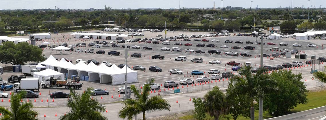 March 23, 2020, Miami Gardens, Florida, United States Of America: MIAMI GARDENS, FL - MARCH 22: FIRST RESPONDERS ONLY TESTING DAY - Instead of setting up for the Miami Open tennis tournament, the Florida National Guard (many without face masks due to shortage) was running a drive-through testing site off the Florida Turnpike at the Hard Rock Stadium in Miami Gardens where people can go for a COVID-19 Test Without Getting out of their Cars. As Miami-Dade Countys number of COVID-19 cases rise to 169, the site will open at 9 a.m. Monday in the east parking lot of the Hard Rock Stadium, 347 Don Shula Drive. The testing is free and the site will be open from 9 a.m. to 5 p.m. on a daily basis, said Juan Diasgranados, a spokesperson for the testing site. The test site will be run and was created by several local, state and national agencies wh - ZUMAs214 20200323_zaa_s214_028 Copyright: xSMGx