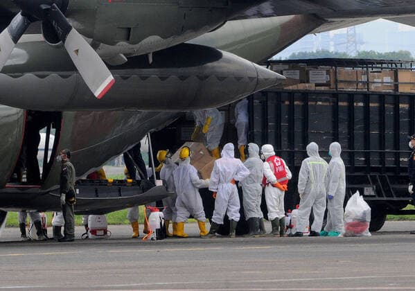 September 5, 2019, Jakarta, Jakarta, Indonesia: Indonesian Air Force C130 Hercules aircraft carrying COVID-19 medical devices from Shanghai, China, arrived at Halim Perdanakusuma Air Force Base, Jakarta on March, 23,2020. The medical devices consist of disposable masks, N95 masks, protective clothing, goggles, gloves, shoe covers, infrared thermometers, and surgical caps, to combat Corona Virus in Indonesia. Jakarta Indonesia - ZUMAr173 20190905_zip_r173_297 Copyright: xDasrilxRoszandix