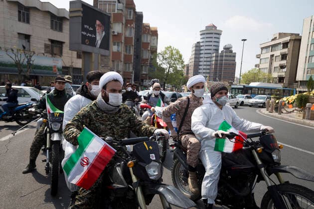 March 25, 2020, Tehran, Iran: Iran s Revolutionary Guard Corps carry out disinfection works as a preventive measure against the coronavirus (Covid-19) pandemic as part of the biological defense drill, launched in coordination with the National Headquarters For Fighting The Coronavirus, in 100 different points in Tehran, Iran. Iran launched the 3-day biological defense drill at 3,000 locations across the country. A total of 143 people in Iran have died of coronavirus over the last 24 hours, pushing the death toll up to 2,077, said Iranian health authorities on Wednesday. Italy, China, Iran, and Spain continue to be the most affected countries. Tehran Iran - ZUMAf146 20200325_zip_f146_028 Copyright: xRouzbehxFouladix