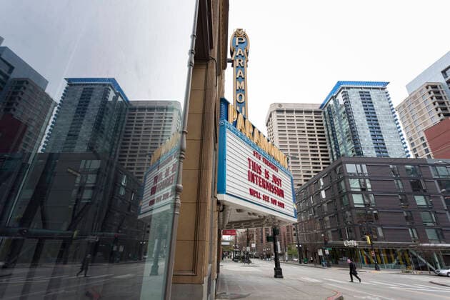 March 28, 2020, Seattle, Washington, U.S: Seattleâ€⠢s Paramount Theaterâ€⠢s marquee displays the hopeful messages â€oeThis is Just Intermission†and â€oeWeâ€⠢ll See You Soon†on Saturday, March 28, 2020. Under governor Jay Insleeâ€⠢s statewide stay home proclamation, now extended until April 6, people are able to leave their homes only for essential activities including grocery shopping, exercise and caring for a family member, friend or pet. Seattle U.S. - ZUMAg235 20200328_zap_g235_010 Copyright: xPaulxChristianxGordonx