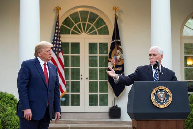 March 29, 2020, Washington, District of Columbia, USA: United States President Donald J. Trump, left, listens as United States Vice President Mike Pence delivers remarks on the COVID-19 pandemic in the Rose Garden of the White House in Washington D.C., U.S. on Sunday, March 29, 2020. Trump announced that restrictions related to the Coronavirus will be extended until April 30, 2020. Credit: CNP Washington USA - ZUMAs152 20200329_zaa_s152_035 Copyright: xStefanixReynoldsx