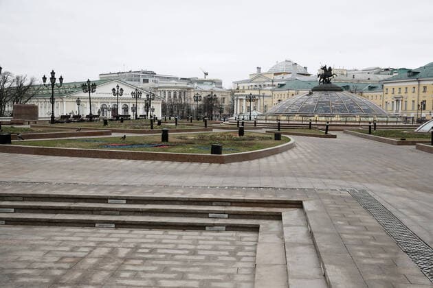 MOSCOW, RUSSIA - MARCH 30, 2020: A view of an empty Manezhnaya Square in central Moscow. The Russian capital s authorities have imposed home isolation for all Moscow residents and restrictions on movement within the city, effective from March 30, 2020, as a measure to contain the spread of the COVID-19 coronavirus infection. As of March 30, 2020, the number of people infected with the new strain of coronavirus worldwide has risen over 724,000, with the death toll reaching over 34,000; Russia has confirmed 1,836 cases with 9 people killed by the disease. Sergei Fadeichev TASS TS0D3DEE