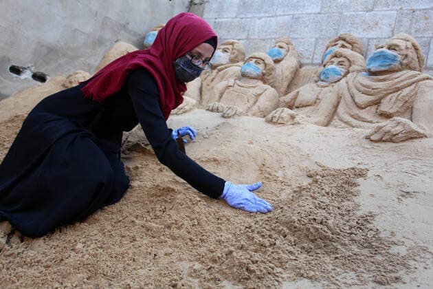 April 3, 2020, Gaza City, Gaza Strip, Palestinian Territory: A Palestinian artist Rana el-Ramlawi, 23, creates a sand sculpture stay home during awareness campaign about the spread of coronavirus disease (COVID-19), at her house Gaza city, on April 3, 2020. The United Nations has warned that a COVID-19 outbreak in Gaza could be disastrous, given the high poverty rates and weak health system in the coastal strip under Israeli blockade since 2007. Authorities in Gaza have said that more than 2,700 Palestinians are in home-isolation, mostly people who had returned from Egypt Gaza City Palestinian Territory - ZUMAap3_ 20200403_zaf_ap3_049 Copyright: xMahmoudxAjjourx