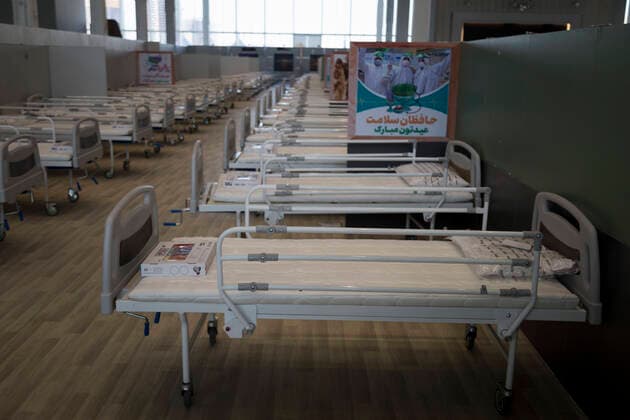 April 4, 2020, Tehran, Iran: A view of a temporary established emergency hospital in a part of the world s largest shopping mall complex called Iran Mall , to treat patients infected with the COVID-19 disease, caused by the SARS-CoV-2 coronavirus, in the northwest of the capital of Tehran, Iran. Due to the new type of coronavirus pandemic, the fairgrounds and gyms are temporarily turned into hospitals in the country. Iran Mall has turned into COVID-19 convalescent care center since the virus outbreak, equipped with about 1000 hospital beds, 20 ventilators, monitoring systems, and other needed equipment. Each day the center hosts 20 recovered ones who discharged from hospitals, and the patients are kept in the second round of quarantine to be up and about. Those in charge are estimating the beds increase to 3000. Tehran Iran - ZUMAf146 20200404_zip_f146_040 Copyright: xRouzbehxFouladix