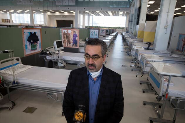 April 4, 2020, Tehran, Iran: Iran s Health Ministry Spokesman, KIANOUSH JAHANPOUR, speaks to media during a visit the temporary established emergency hospital in a part of the world s largest shopping mall complex called Iran Mall , to treat patients infected with the COVID-19 disease, caused by the SARS-CoV-2 coronavirus, in the northwest of the capital of Tehran, Iran. Due to the new type of coronavirus pandemic, the fairgrounds and gyms are temporarily turned into hospitals in the country. Iran Mall has turned into COVID-19 convalescent care center since the virus outbreak, equipped with about 1000 hospital beds, 20 ventilators, monitoring systems, and other needed equipment. Each day the center hosts 20 recovered ones who discharged from hospitals, and the patients are kept in the second round of quarantine to be up and about. Tho - ZUMAf146 20200404_zip_f146_056 Copyright: xRouzbehxFouladix