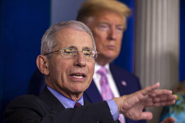 U.S. President Donald Trump listens to Anthony Fauci, Director of the National Institute of Allergy and Infectious Diseases speak at the coronavirus briefing at the White House Washington, D.C., U.S., on Saturday, April 4, 2020. New York s death toll from coronavirus on Saturday surpassed 3,500 as confirmed cases rose to 113,704, bringing the U.S. total to more than 7,700 fatalities and 287,000 cases. wax20200404101 TasosxKatopodis