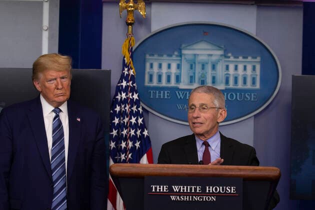 April 5, 2020, Washington, District of Columbia, USA: United States President Donald J. Trump listens as Director of the National Institute of Allergy and Infectious Diseases at the National Institutes of Health Dr. Anthony Fauci speaks at the coronavirus briefing at the White House Washington, D.C., U.S., on Sunday, April 5, 2020. The next two weeks will be crucial in the United States fight against the coronavirus, warn health officials, who are urging Americans to continue practicing social-distancing measures. .Credit: Pool via CNP Washington USA - ZUMAs152 20200405_zaa_s152_036 Copyright: xTasosxKatopodisx