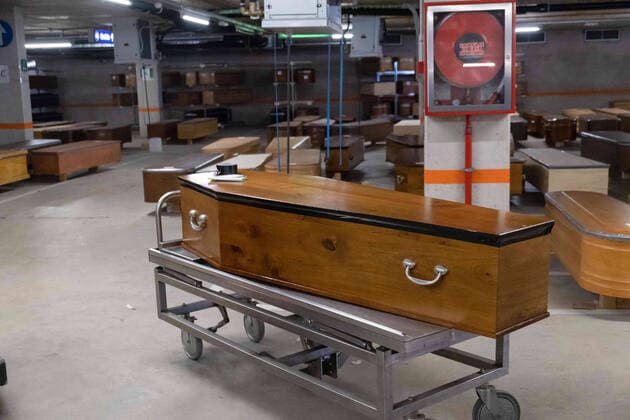April 8, 2020, Barcelona, Spain: Coffins full of dead bodies from Coronavirus (Covid-19) in the Collserola mortuary parking lot. This space has been converted into a morgue due to the increase in deaths of Covid19...Coronavirus outbreak in Spain has already killed 14,659 people. The large number of deaths has forced Eurocoffin, the main coffin factory in Catalonia, to triple its production, from 50 to 150 coffins per day. Isolation and quarantine prevent family members from gettting infected or infect others. In Spain today, the pandemic leaves numbers of 146,690 infected and 48,021 recovered. Barcelona Spain - ZUMAs197 20200408_zaa_s197_160 Copyright: xPabloxMiranzox