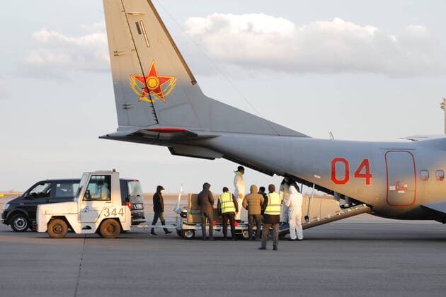 (200410) -- NUR-SULTAN, April 10, 2020 (Xinhua) -- Workers unload Chinese-donated medical supplies at the Nursultan Nazarbayev International Airport, Nur-Sultan, Kazakhstan, April 9, 2020. A Chinese medical team arrived in the Kazakh capital Nur-Sultan on Thursday to assist Kazakhstan s ongoing efforts in fight against COVID-19. The 10-member team also brought medical assistance including 4,800 N95 respirators, 49,600 disposable surgical masks, 2,000 protection suits, 2 ventilators and other medicines. (Photo by Kalizhan Ospanov Xinhua) KAZAKHSTAN-NUR-SULTAN-CHINESE MEDICAL TEAM-ARRIVAL